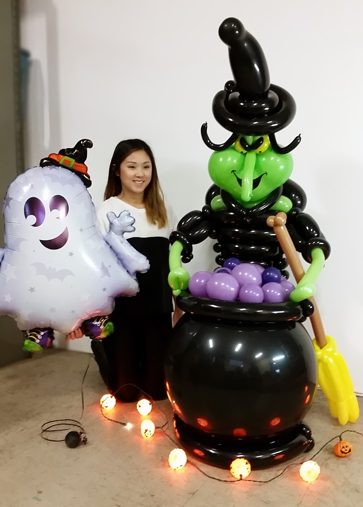 Halloween witch and ghost brewing trouble